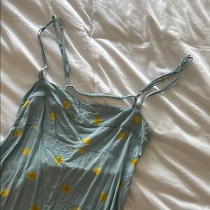 Stylish Blue Dress with Yellow Star Accents